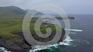 Flying Above the Shpanberg Lighthouseon Shikotan Island.  on Cape. Lesser Kuril Chain, Russia.