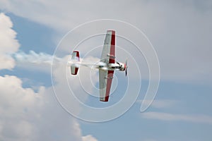 Flying airplane in the blue sky