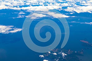 Flying in an airplane somewhere over the landscape of Costa Rica