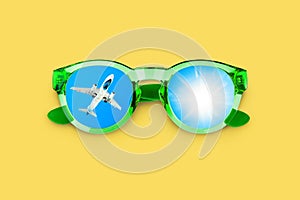 Flying airplane, sun, blue sky, sunglasses reflection, glasses, summer holidays, vacation flight, travel agency, tourism