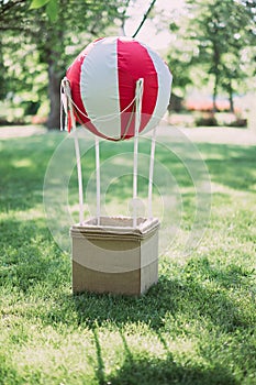 the flying Balloon of the small sizes on the earth. The flying device the balloon for children