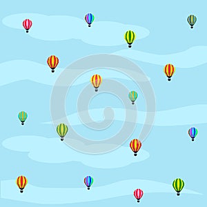 Flying balloons in the sky with cloudy blue background