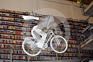 Flying bicycle. Books store in Lisbon, Portugal. Livraria Ler devagar. LX Factory. Tourism. Education. Visit Portugal.