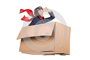 Flying businessman in a cardboard box