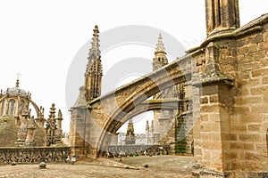 The flying buttress from the roof of the cathedral of Sevilla, Spain during winter