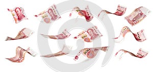 Flying of China Yuan banknote on white background. Yuan banknote is main and popular currency of exchange in the world.Investment photo