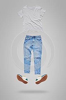 Flying clothes on gray background for mockup.