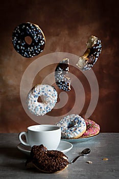 Flying Colourfull Donuts and coffee