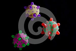 Flying coronavirus bacteria on a black background.