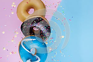 Flying doughnuts on blue