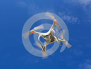 flying drone in blue sky