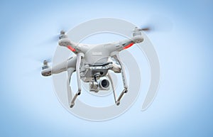 Flying drone with camera photo