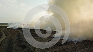 Flying a drone over a fire that occurred at a landfill on the island of Bali.