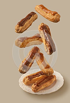 Flying eclairs with cocoa icing and condensed milk filling