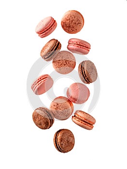 Flying or falling macarons, isolated on white