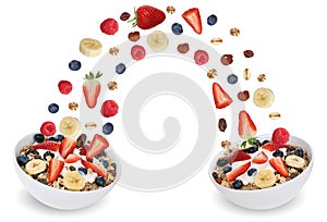 Flying fruit muesli for breakfast in bowl with fruits like banana and strawberry