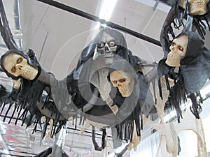 A flying ghost wrath Halloween decorations hanging from the ceiling