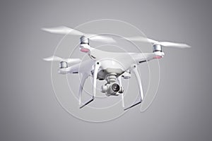 Flying helicopter drone with camera. Studio shot.