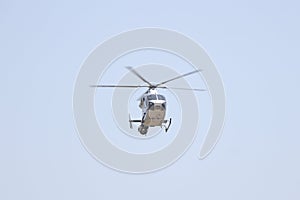 Flying helicopter in the sky