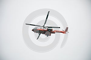 Flying helicopter in the sky