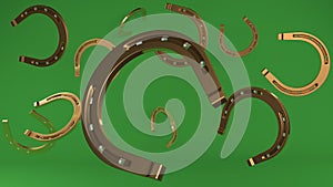 Flying horseshoes in golden color on green