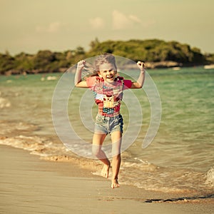 Flying jumping beach girl at blue sea shore