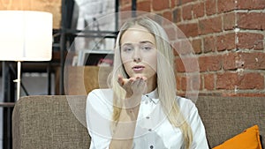 Flying Kiss by Young Brunette Woman, Indoor,Young,,,,