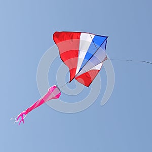 Flying kite in the blue sky