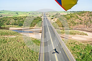 Flying Microlight Aerial Toll Road River Overhead Rural Farmlands