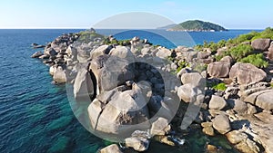 Flying Next to Huge Stones at Similan Island Number 4 Cape. Aerial View HD Slowmotion. Andaman Sea, Thailand.