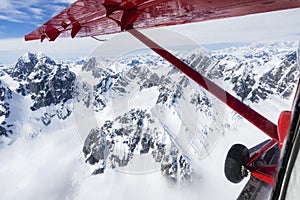 Flying over the Alaska Range on a small ski plane