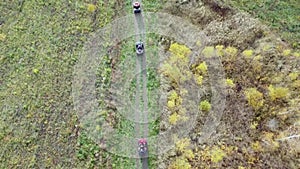 Flying over ATV drivers flat, aerial photography from a quadcopter, background field and forest