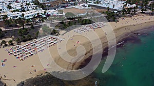 Flying over beach full of people in Turkey