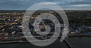 Flying over a beautiful European city at sunset. Waterford Ireland 5k