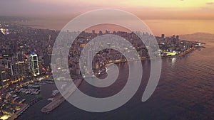 Flying over Beirut Zaytunay bay marina and downtown. Drone aerial shot of Beirut, Lebanon, during sunset.