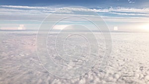 Flying over cirrus and cumulus clouds,video