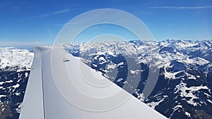 Flying over the dolomites with snow