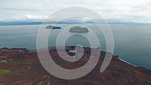 Flying over Eldfell volcano on Heimaey island (Westman Islands) in Iceland