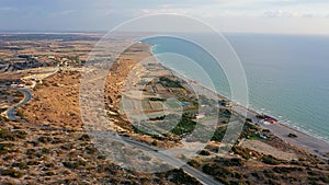 Flying over Episkopi bay and Kourion stadium and archaeological site. Limassol District, Cyprus