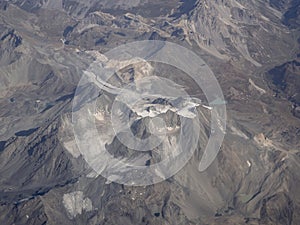 Flying over the European Alps during fall season. Landscape at the glaciers. Melting of glaciers