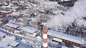 Flying over factory chimney