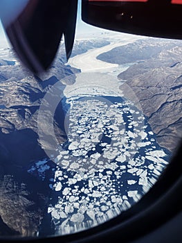 Flying over Greenland. Passenger view.