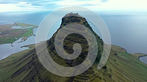 Flying over Kirkjufell mountain, one of Iceland magnificent landmarks on the Snaefellsnes peninsula
