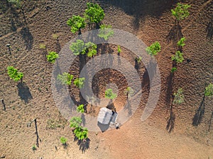 Flying over mountains and denuded forest area