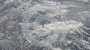 Flying over North America during winter season. Landscape from the airplane