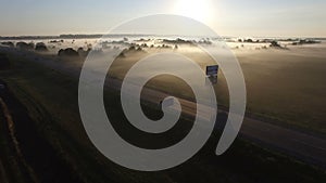 Flying over road fog mist rural countryside