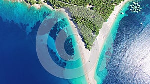 Flying over of the sandy beach Zlatni rat on the island of Brac, Croatia