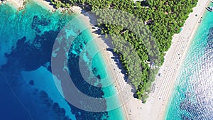 Flying over of the sandy beach Zlatni rat on the island of Brac, Croatia