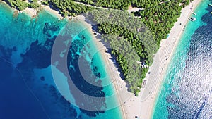 Flying over of the sandy beach Zlatni rat on the island of Brac, Croatia