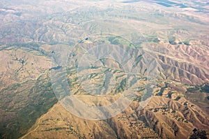 Flying over sierra national forest hills and valleys photo
